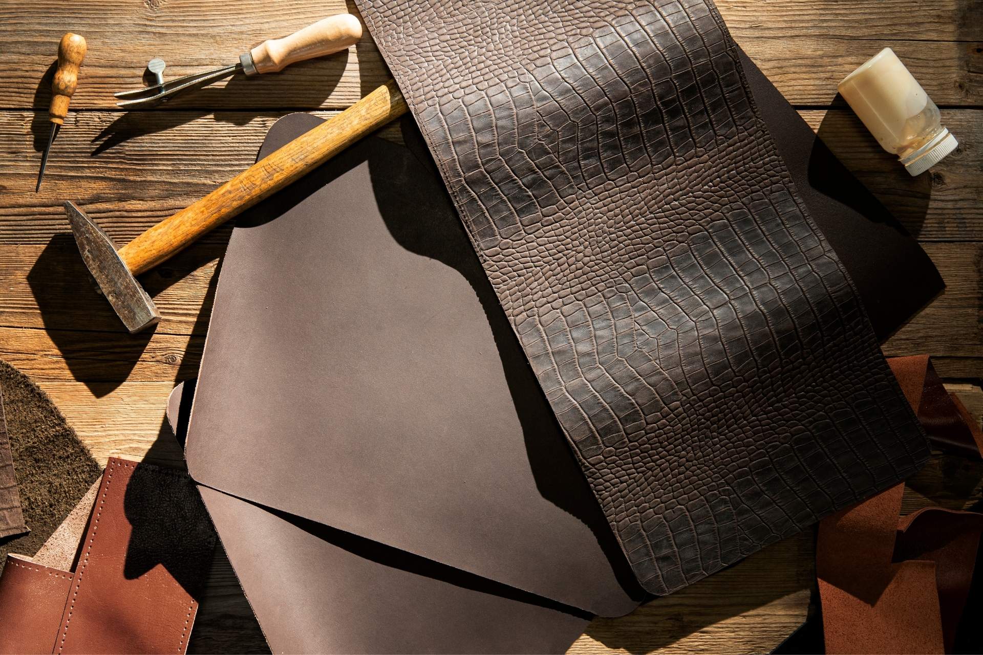 Artisan handcrafting a leather bag